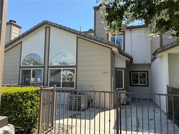 a front view of a house with balcony