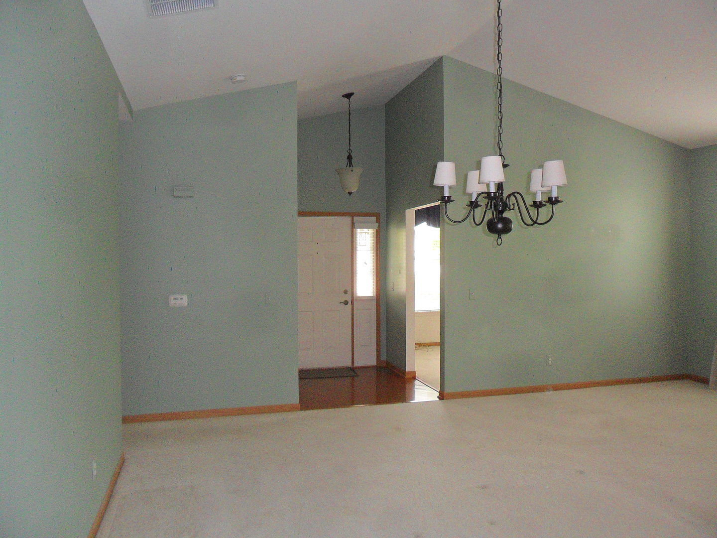 678 Cadillac Circle Romeoville, IL 60446 - Photo 3 of 19 wooden floor in an empty room with a window