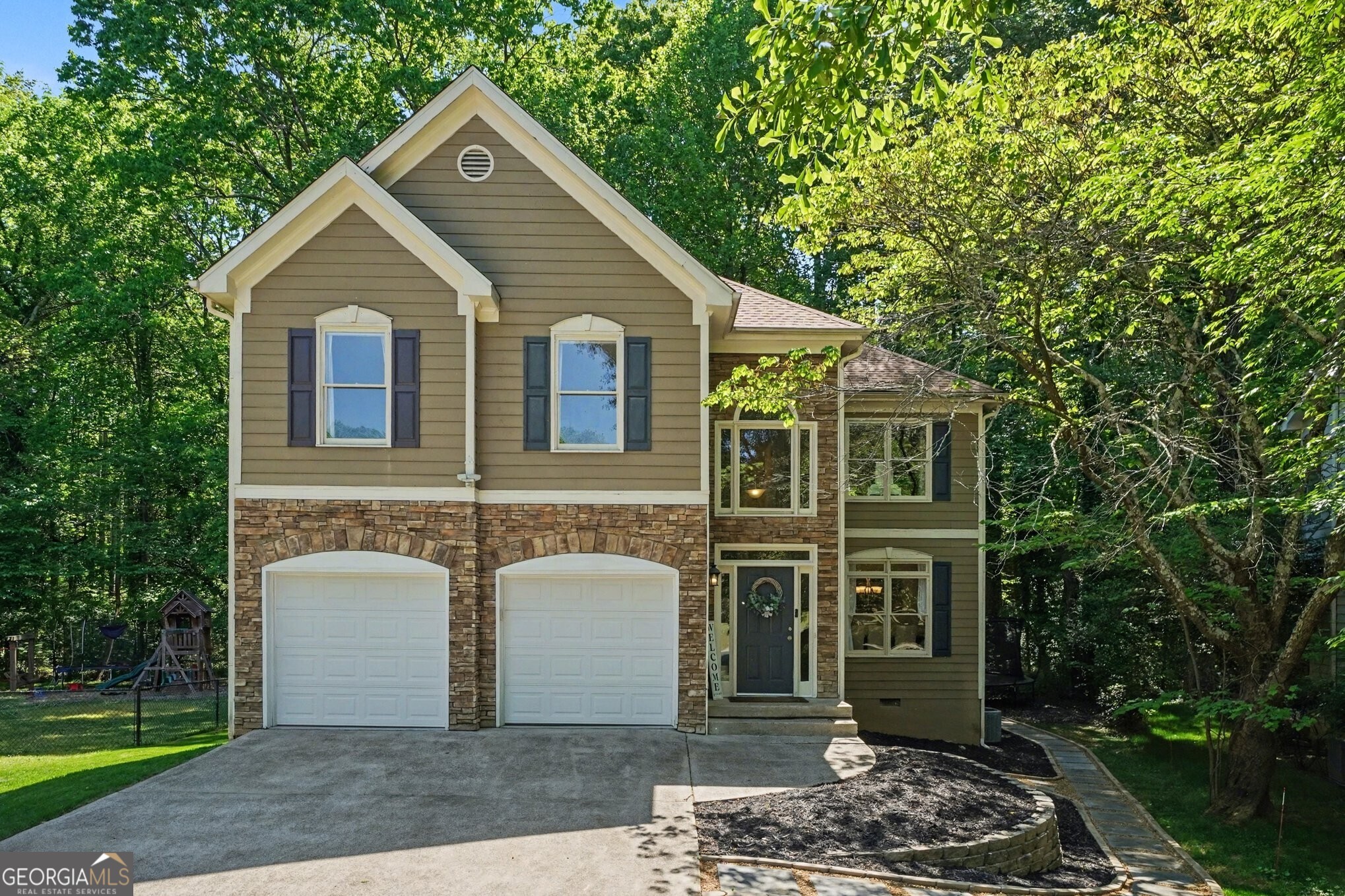2159 Chartley Place Marietta, GA 30062 - Photo 1 of 1 Front Exterior With Mature Landscaping And Welcoming Entryway
