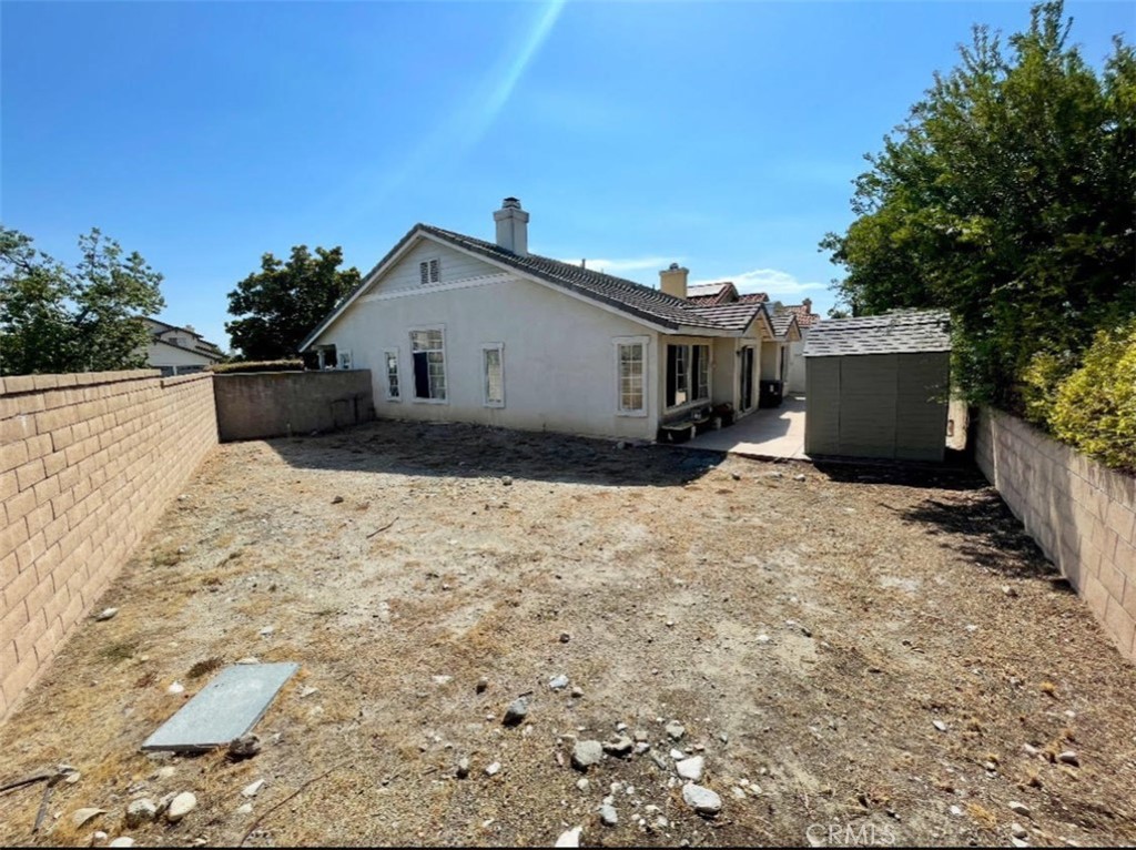 10980 Santa Barbara Place Rancho Cucamonga, CA 91701 - Photo 2 of 4 a view of a house with a yard