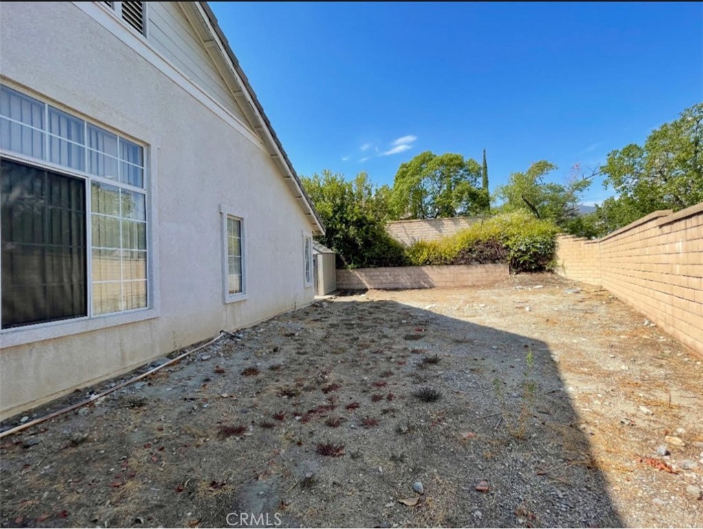 10980 Santa Barbara Place Rancho Cucamonga, CA 91701 - Photo 3 of 4 a view of a backyard