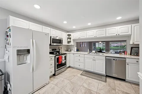 $515,000 | 3373 Deer Creek Lake Shore Drive, Deerfield Beach, FL 33442