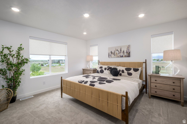 267 Fushion Lane Draper, UT 84020 - Photo 21 of 26 Spacious bedroom filled with natural light and calming ambiance. * model home photo