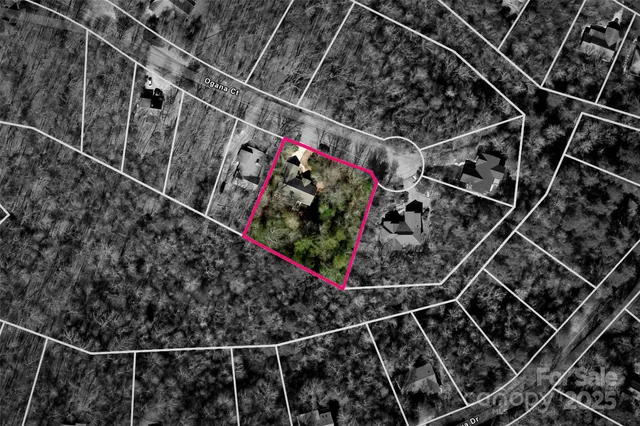 a view of a chairs and table in the balcony