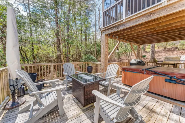 a view of a balcony with wooden floor