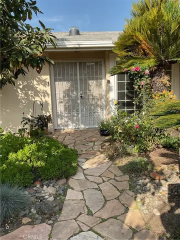 a view of a bathroom with a sink and a shower