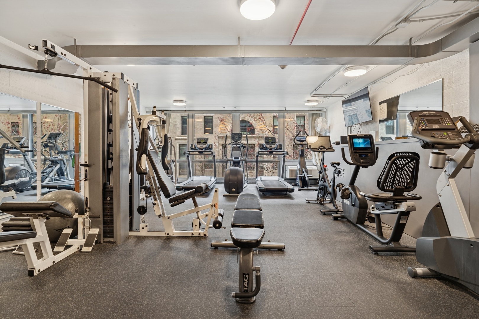 880 North Lake Shore Drive, Unit 11D Chicago, IL 60611 - Photo 14 of 15 a view of a room with gym equipment