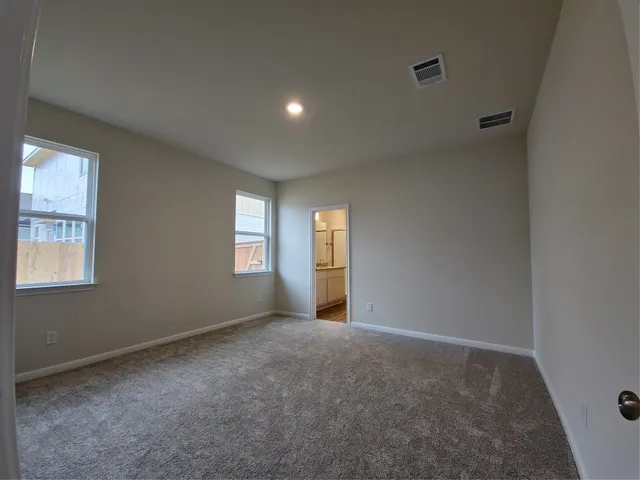 an empty room with windows