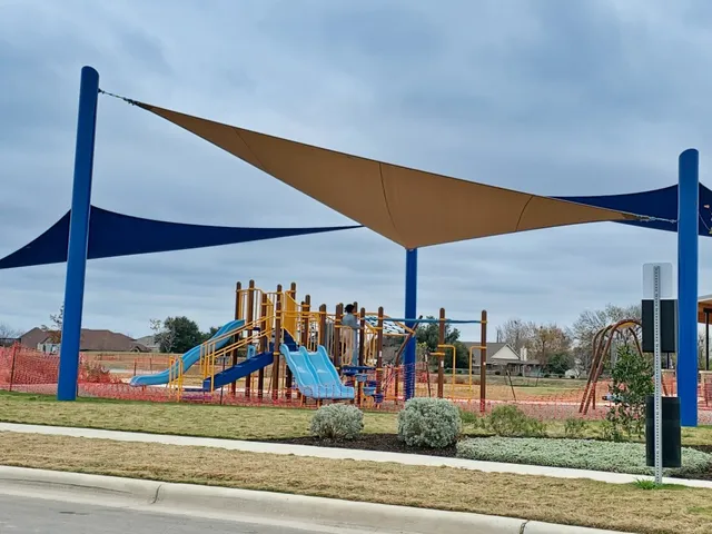 a group of people walking down a street
