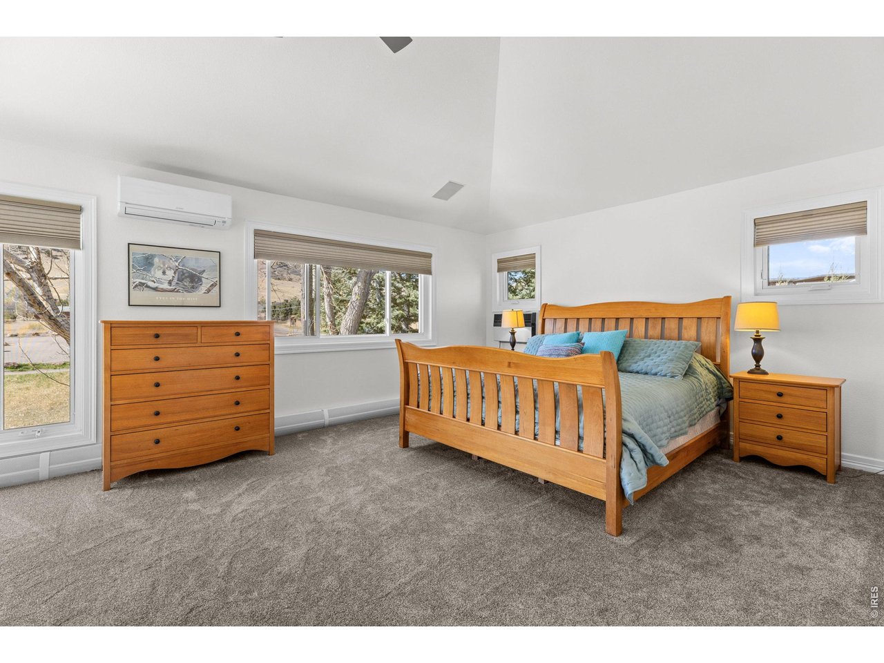 4825 6th Street Boulder, CO 80304 - Photo 16 of 50 a bedroom with a bed and a dresser