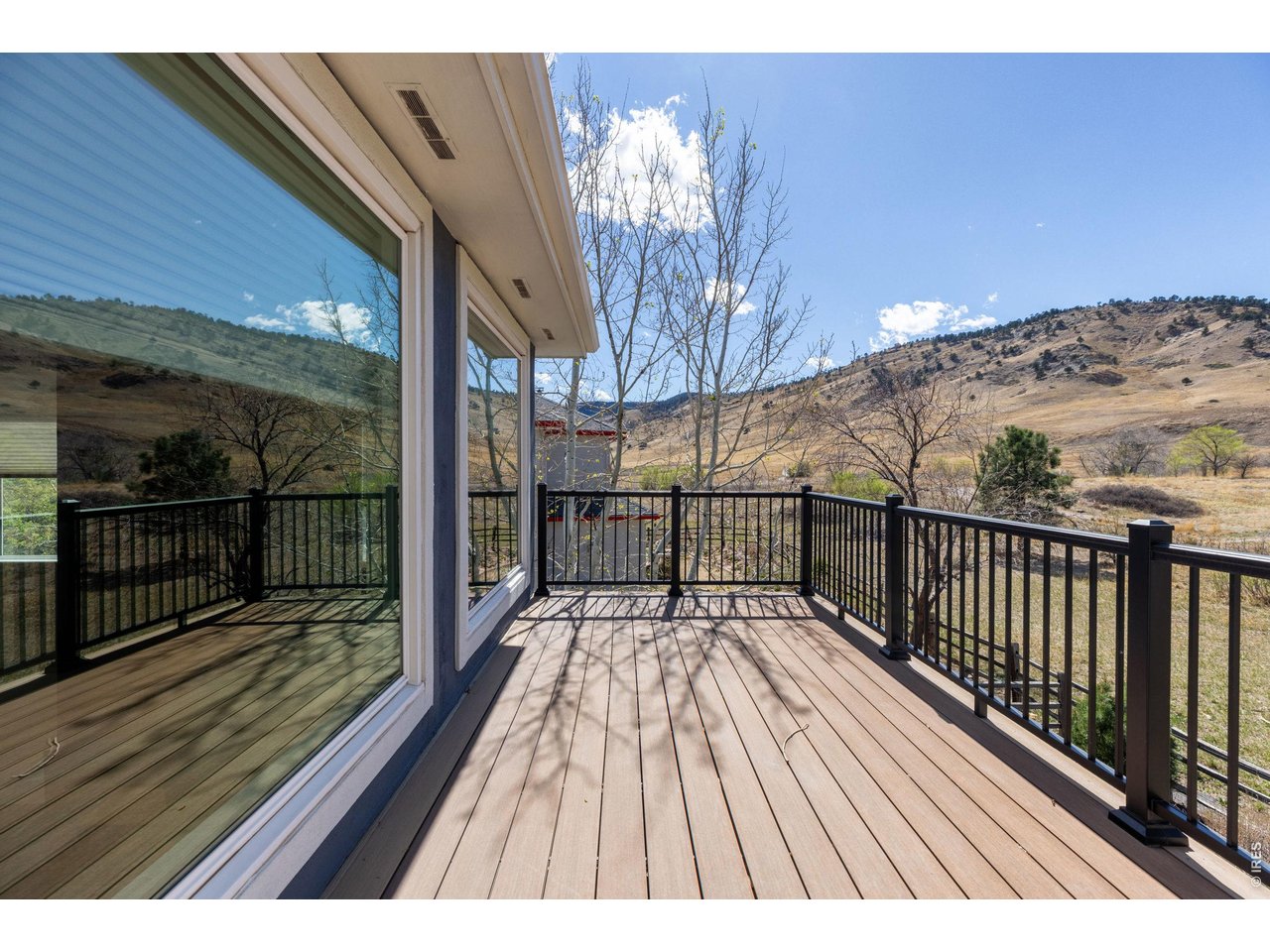 4825 6th Street Boulder, CO 80304 - Photo 18 of 50 a view of balcony with wooden floor