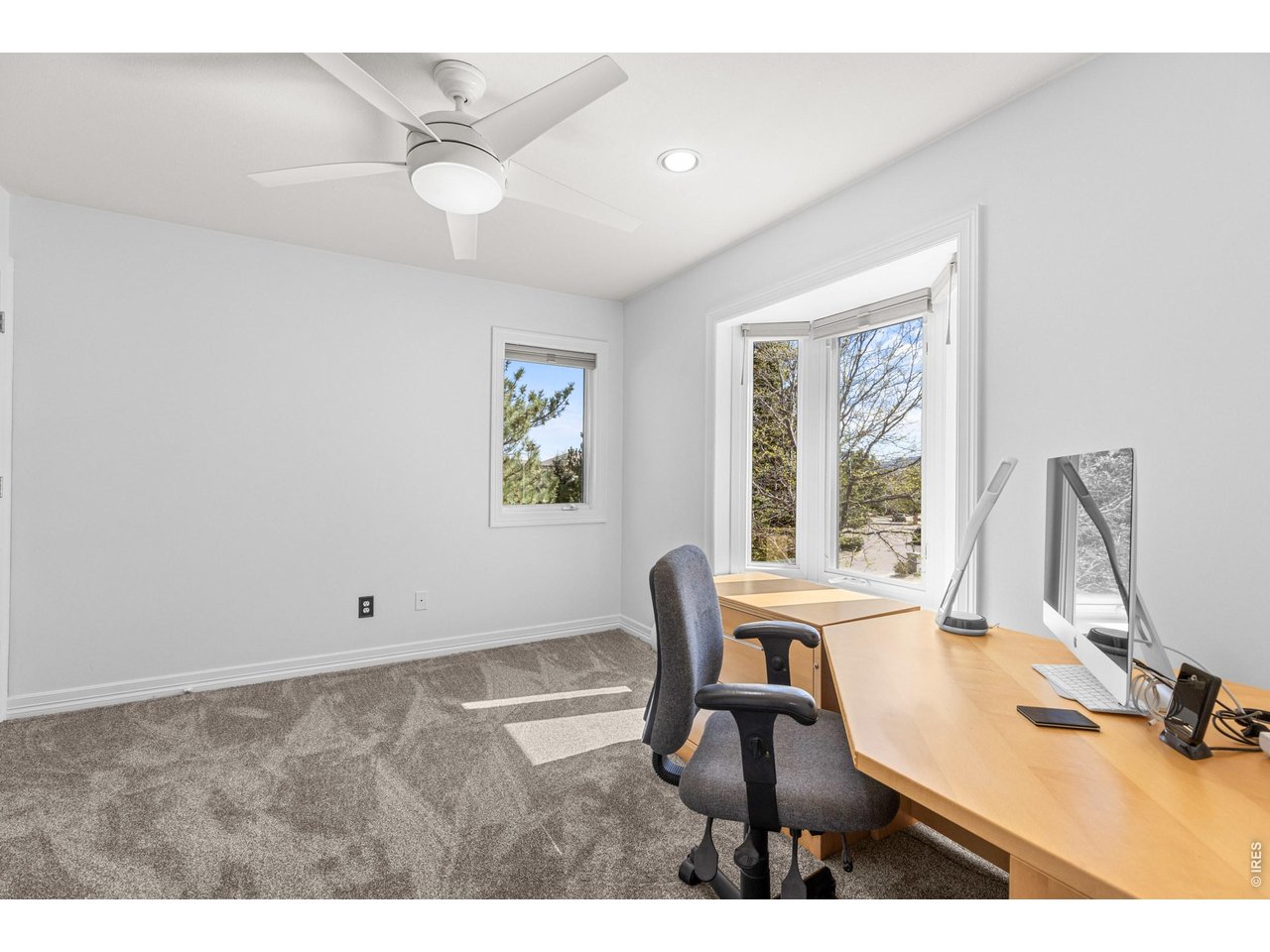 4825 6th Street Boulder, CO 80304 - Photo 24 of 50 a view of a workspace with furniture and a window