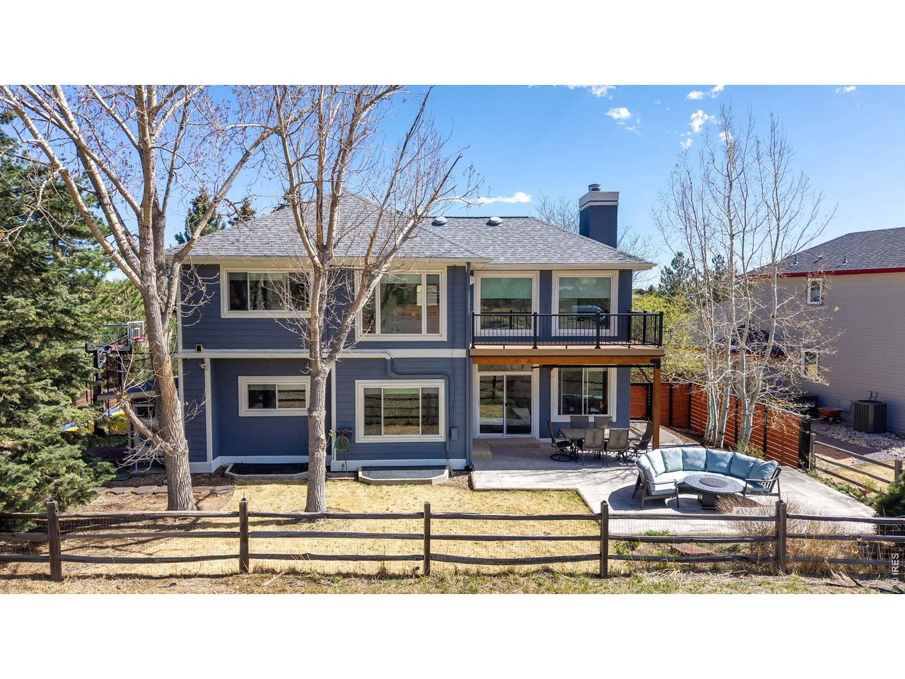 4825 6th Street Boulder, CO 80304 - Photo 39 of 50 a front view of a house with a yard