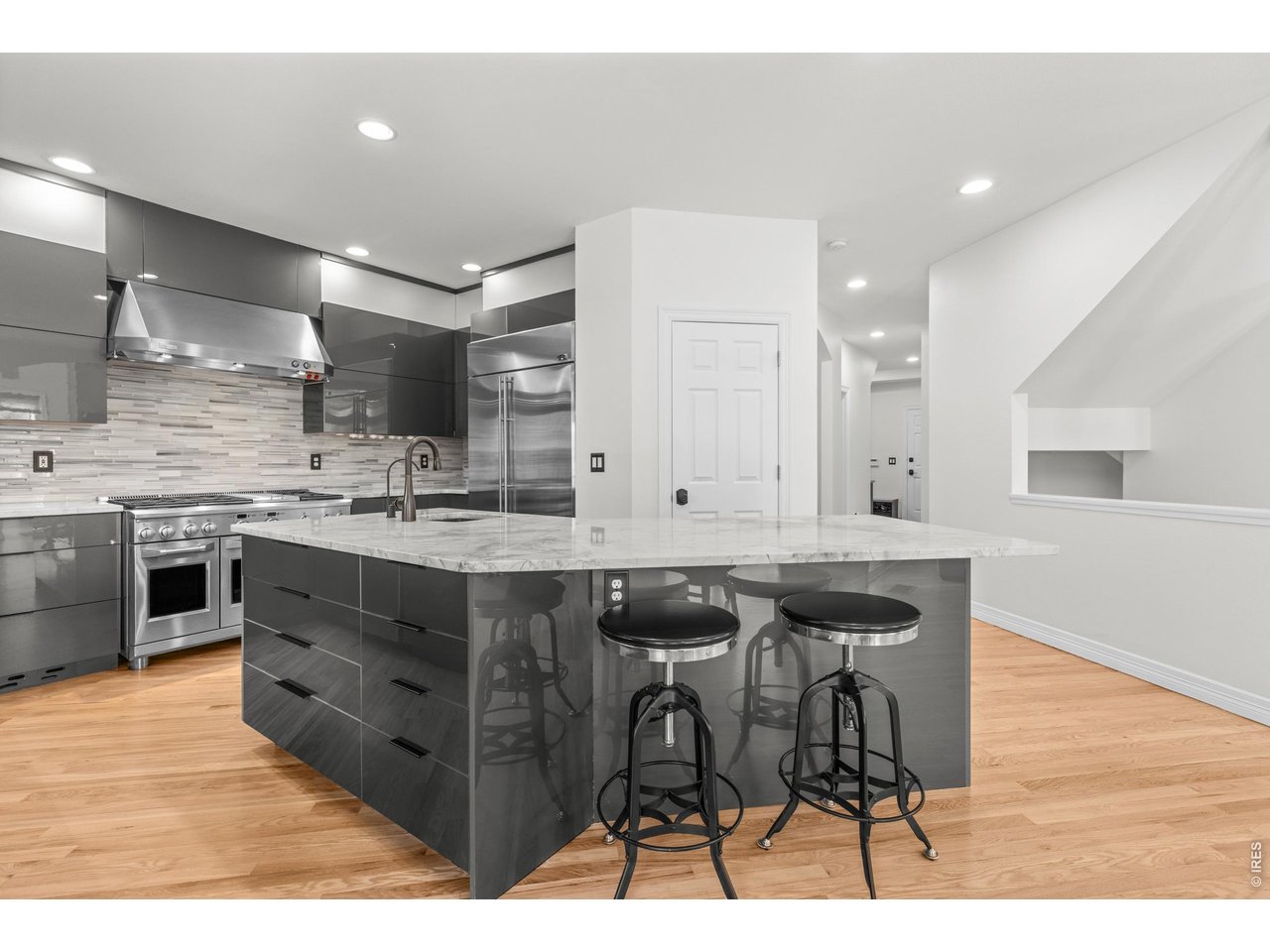 4825 6th Street Boulder, CO 80304 - Photo 7 of 50 a kitchen with a table and chairs in it