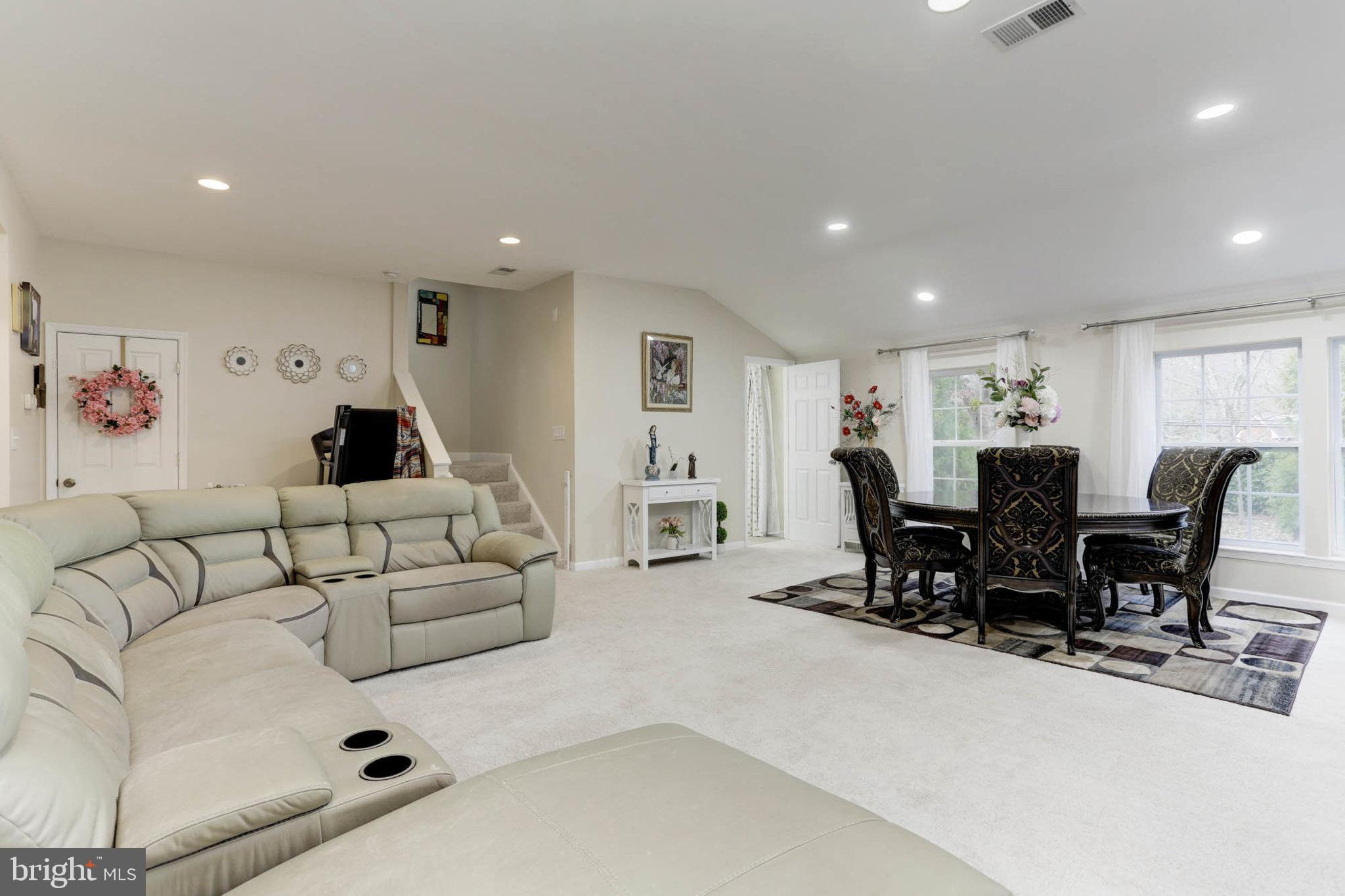 7465 Browns Bridge Road Highland, MD 20777 - Photo 5 of 37 a living room with furniture and wooden floor