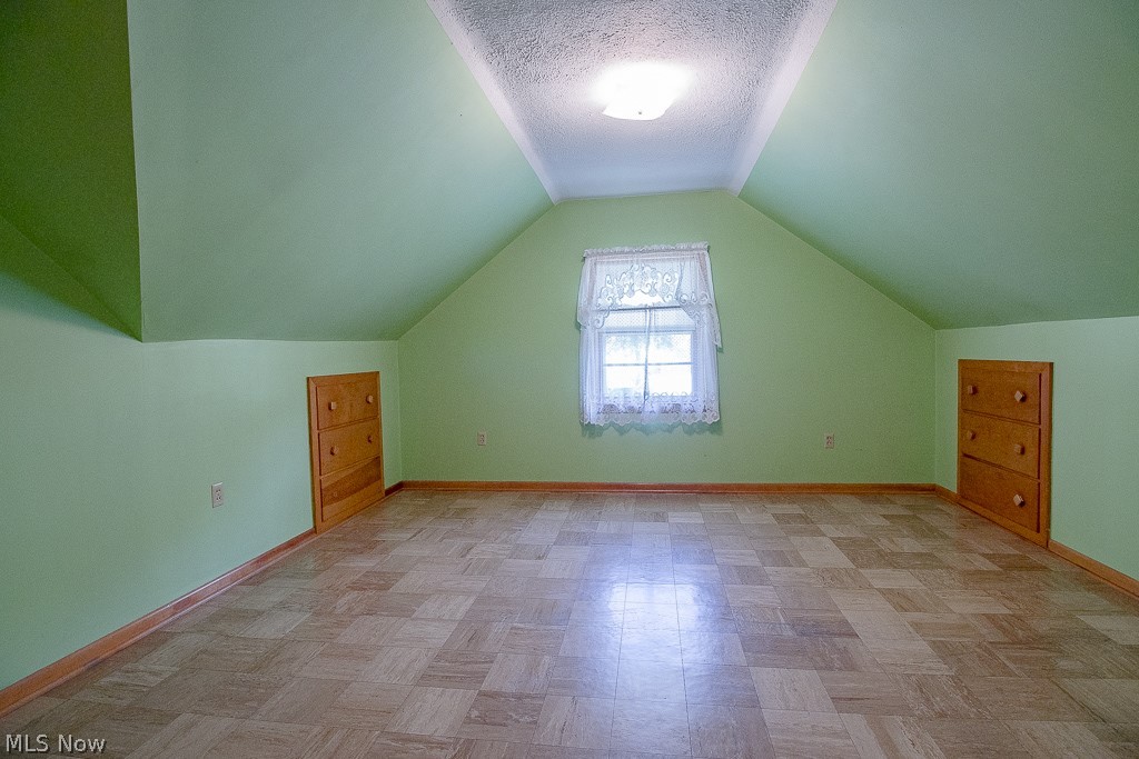 31654 Densmore Road Willowick, OH 44095 - Photo 18 of 25 Oversized bedroom on the second floor with a walk in closet and built in dressers.