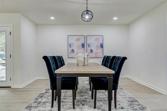 a view of a dining room with furniture