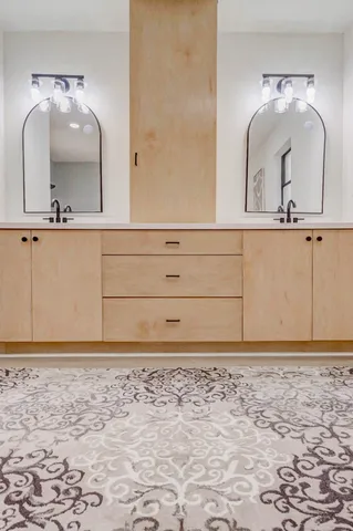 a bathroom with a toilet and a sink