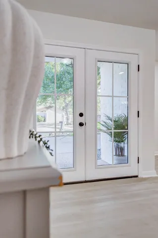 a view of a park with large trees