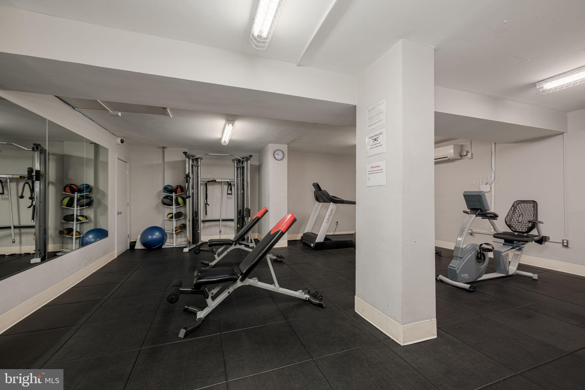 4000 Tunlaw Road Northwest, Unit 600 Washington, DC 20007 - Photo 16 of 27 a view of a room with gym equipment