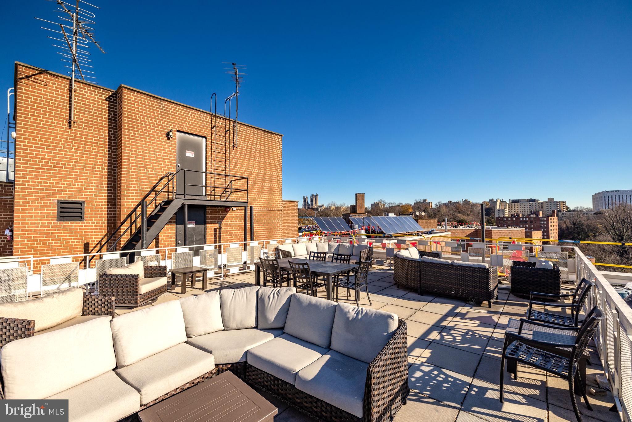 4000 Tunlaw Road Northwest, Unit 600 Washington, DC 20007 - Photo 22 of 27 a view of city from balcony with seating space