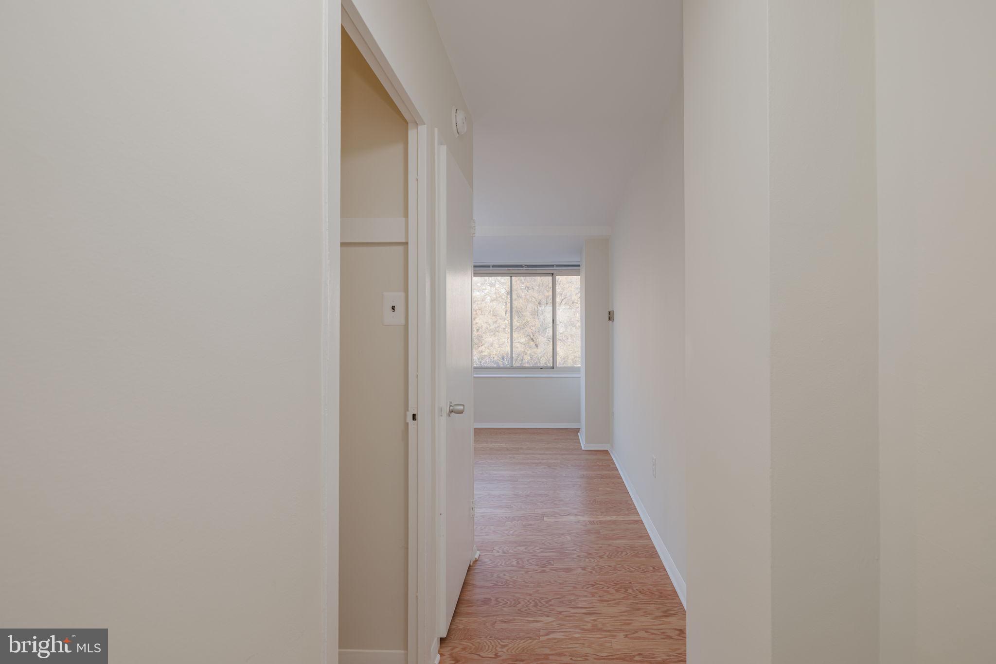 4000 Tunlaw Road Northwest, Unit 600 Washington, DC 20007 - Photo 5 of 27 a view of a hallway with wooden floor