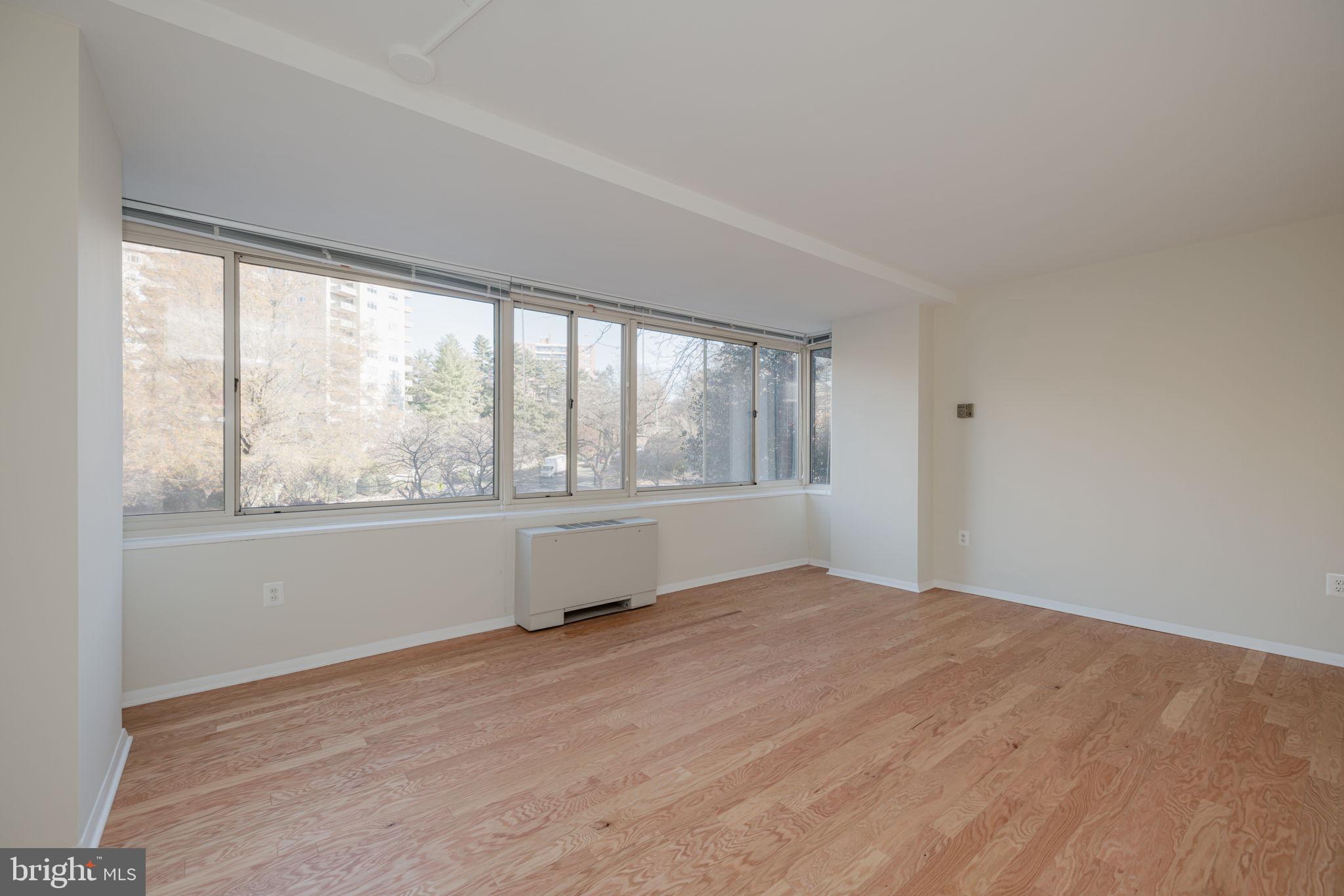 4000 Tunlaw Road Northwest, Unit 600 Washington, DC 20007 - Photo 6 of 27 a view of an empty room with a window