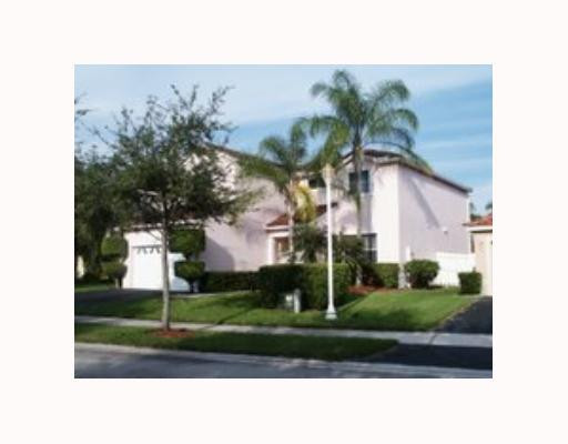 907 Stanton Drive Weston, FL 33326 - Photo 1 of 5 a black and white photo of a house