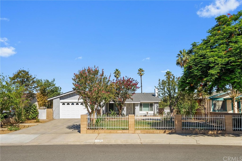 front view of a house with a street