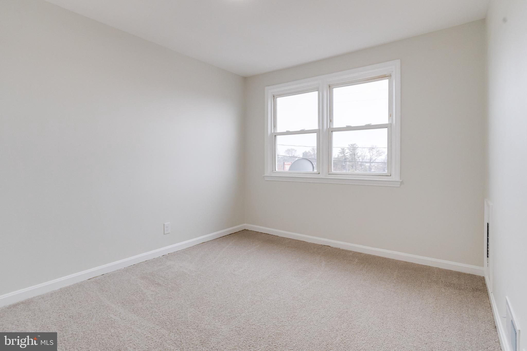 3916 2nd Street Baltimore, MD 21225 - Photo 14 of 20 an empty room with a window