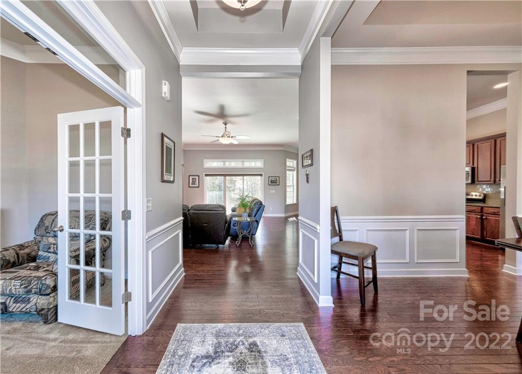 949 Solandra Way Tega Cay, SC 29708 - Photo 3 of 48 a view of a livingroom with furniture wooden floor and a rug
