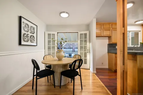 a kitchen with granite countertop a sink and a stove