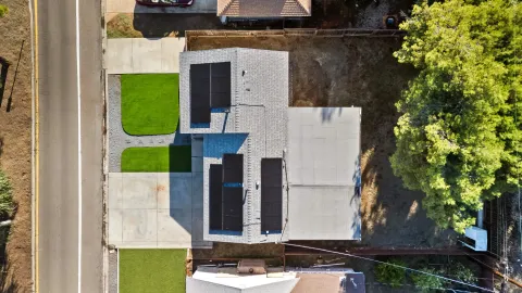 a living room with furniture wooden floor and a table