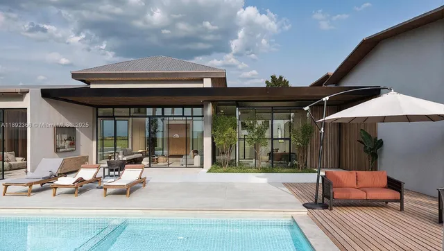 a building outdoor space with patio furniture and potted plants