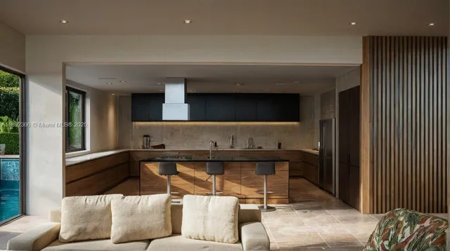 a living room with a couch and a potted plant