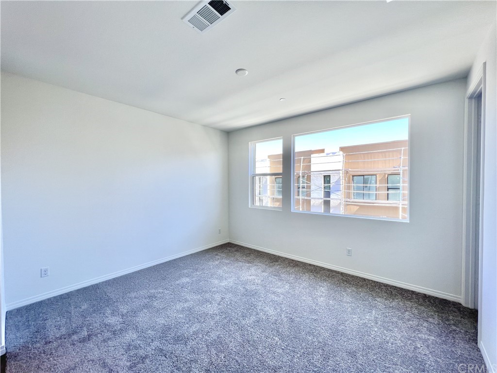 126 Sawbuck Irvine, CA 92618 - Photo 7 of 10 an empty room with a window