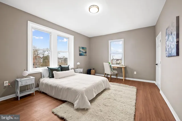a bathroom with a shower and a toilet