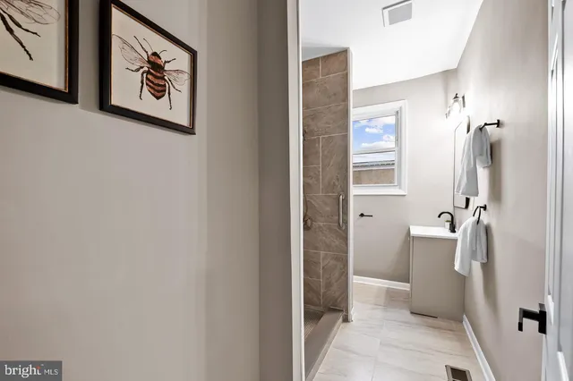 a workspace with furniture and a wooden floor