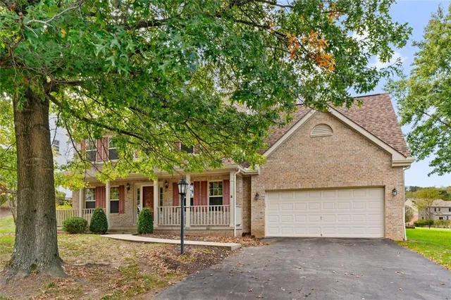 front view of a house with a street