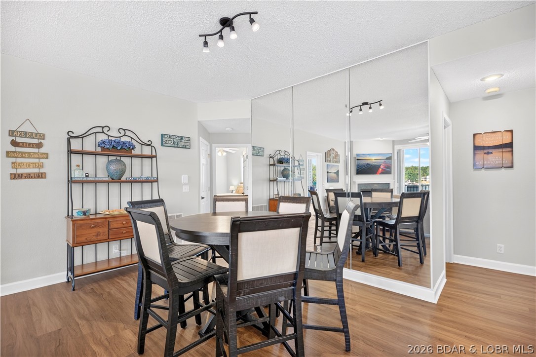 73 Evergreen Road, Unit 3A Sunrise Beach, MO 65079 - Photo 25 of 89 Dine and look at reflections of the lake in all di