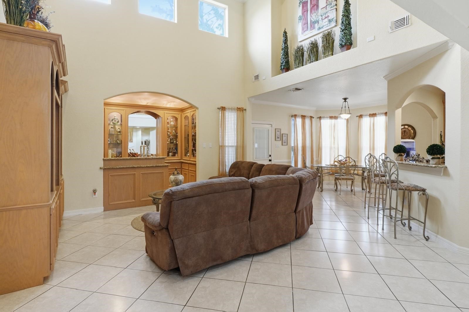 247 Old Spring Lane Houston, TX 77015 - Photo 11 of 25 a living room with furniture and a large window
