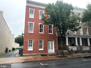 425 North Market Street, Unit 1 Frederick, MD 21701 - Photo 1 of 1 a front view of residential houses