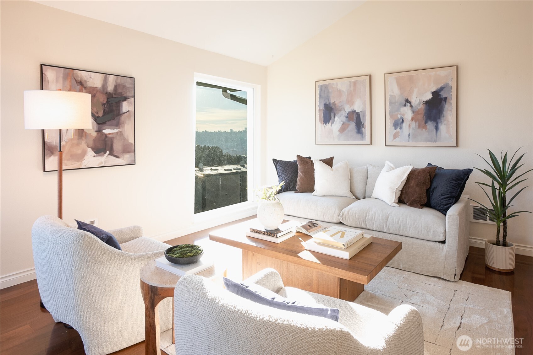 2510 West Bertona Street, Unit 428 Seattle, WA 98199 - Photo 14 of 35 a living room with furniture and painting on the wall