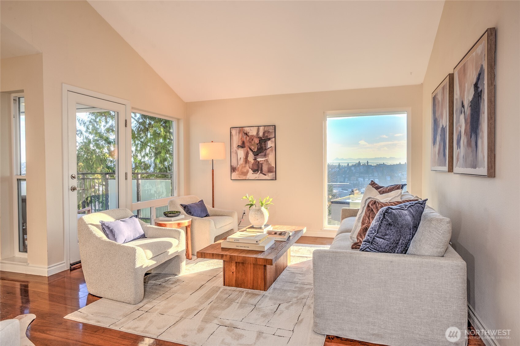 2510 West Bertona Street, Unit 428 Seattle, WA 98199 - Photo 15 of 35 a living room with furniture and a large window