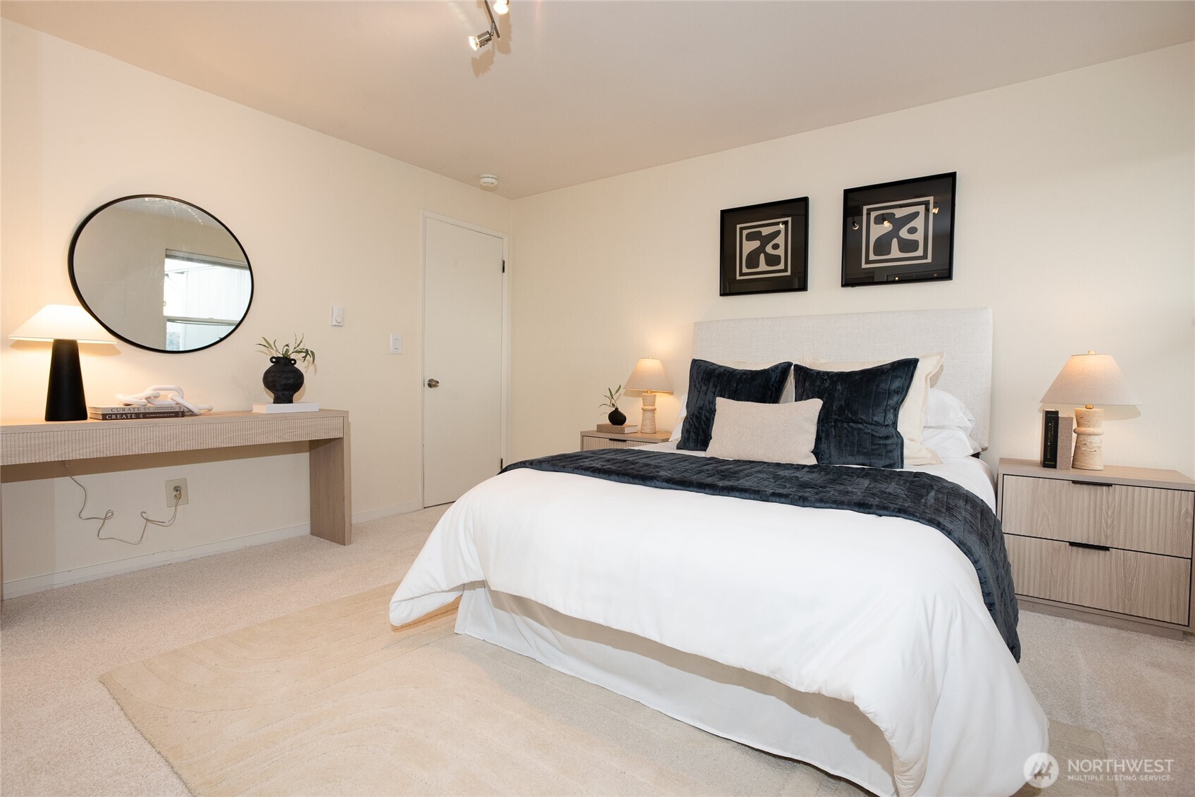 2510 West Bertona Street, Unit 428 Seattle, WA 98199 - Photo 19 of 35 a bedroom with a bed and a dresser