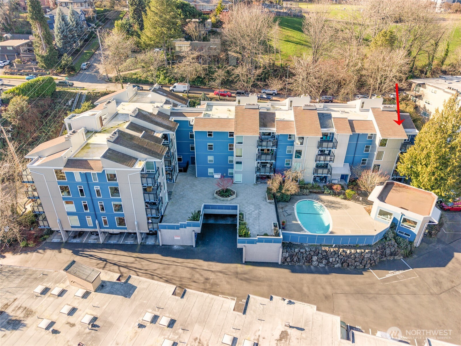 2510 West Bertona Street, Unit 428 Seattle, WA 98199 - Photo 2 of 35 a building outdoor space with lots of sitting space