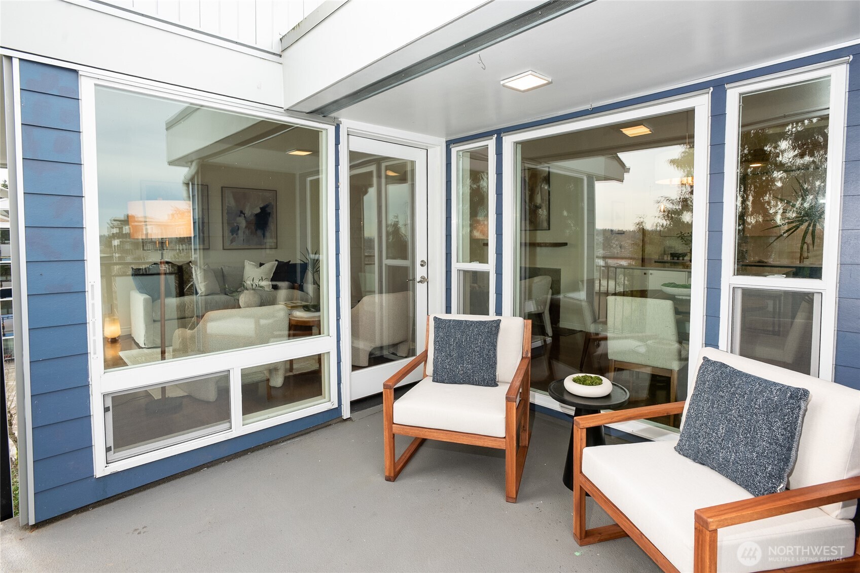 2510 West Bertona Street, Unit 428 Seattle, WA 98199 - Photo 22 of 35 a outdoor living space with a couch