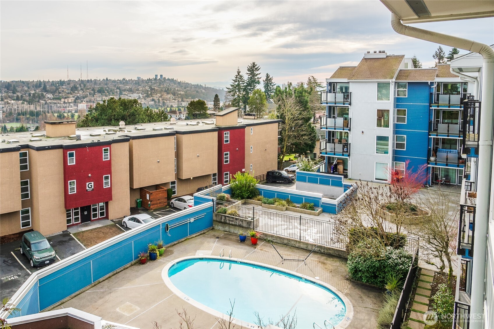 2510 West Bertona Street, Unit 428 Seattle, WA 98199 - Photo 26 of 35 a view of swimming pool with a lounge chairs
