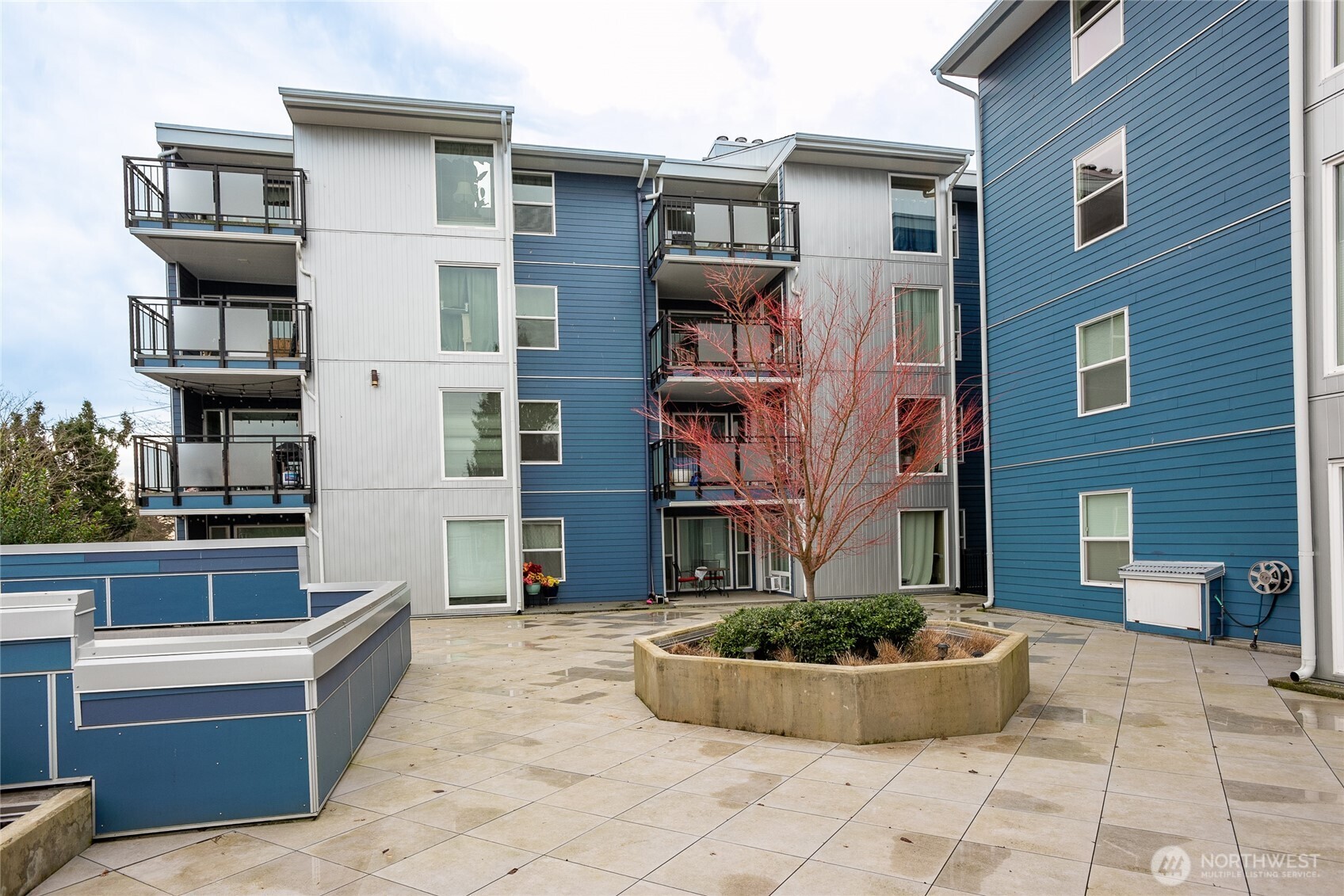 2510 West Bertona Street, Unit 428 Seattle, WA 98199 - Photo 28 of 35 a view of multiple house with outdoor space