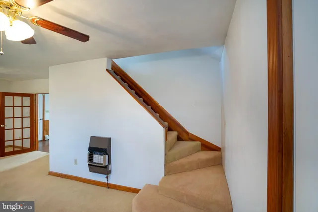 a bathroom with a shower and a bath tub